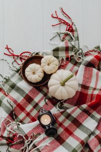 Kaboompics - Top View of Autumn Pumpkins and Candle on Blanket