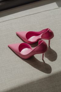 Kaboompics - Pink Pumps with Fashion Magazine on a Sofa