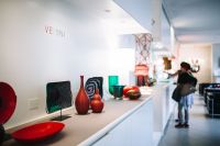 Kaboompics - Venini Glass Showroom Interior with Display Shelves and Visitor
