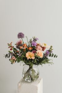 Kaboompics - Seasonal Bouquet in Glass Vase With Copy Space