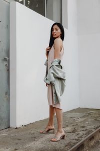 Kaboompics - Side View of Woman in Pale Dress with Gray Jacket and Neutral Street Style