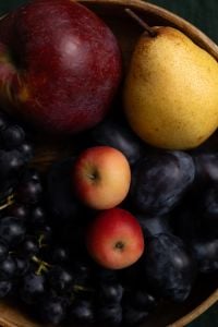 Kaboompics - Moody Autumn Fruit Still Life With Grapes Pears Apples and Plums
