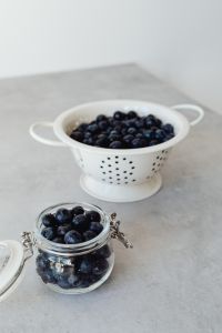 Kaboompics - Blueberries in White Colander and Glass Jar
