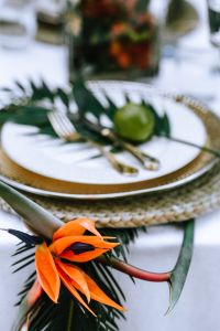 Kaboompics - Blurred Tropical Floral Table Setting with Soft-Focus Foreground