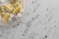 Kaboompics - Crystal Bowl of Vitamins on White Marble