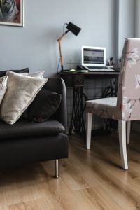 Kaboompics - Empty Home Office With Laptop, Black Desk Lamp And Floral Chair
