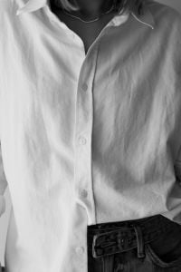 Kaboompics - Faceless Woman in White Shirt and Jeans in Monochrome
