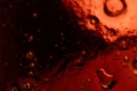 Kaboompics - Dark Red Water Droplets Glass Texture Background