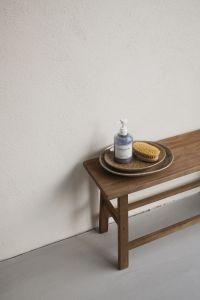 Kaboompics - Wooden Bench with Soap and Body Brush on Ceramic Plates