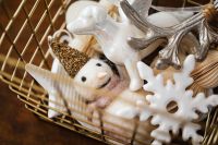 Kaboompics - Christmas Ornament Basket with Nutcracker and White Decorations