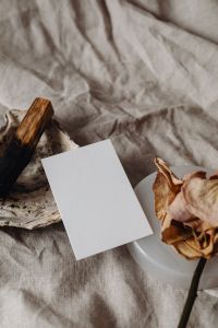 Kaboompics - Minimal Blank Card with Copy Space on Linen beside Ceramic Plate