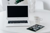 Kaboompics - Workplace with laptop on table at home