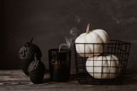 Kaboompics - Smoky Black Candle and White Pumpkins for Halloween