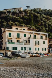 Kaboompics - Rooftop Details and Green Hillside Above Marina di Puolo, Italy