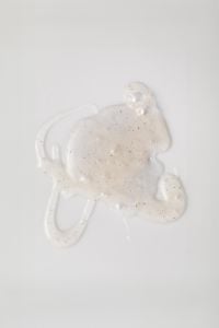 Kaboompics - Minimal Transparent Gel Drops with Micro Bubbles Close-Up on Clean Background