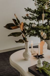 Kaboompics - Christmas Table Decor with Candles, Vase and Holiday Village