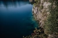Kaboompics - Autumn Berries and Limestone Shore Beside Blue Water