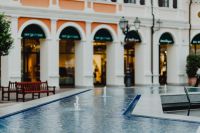 Kaboompics - Fountain and Blurred Designer Outlet Stores