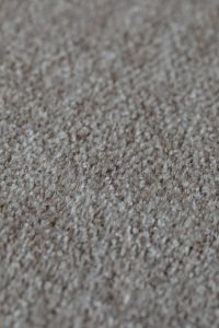Kaboompics - Close-Up of Light Beige Woven Bouclé Upholstery Fabric