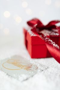 Kaboompics - Red Christmas Gift with Happy New Year Card and Sparkling Ribbon