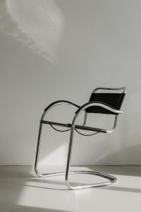 Kaboompics - Close-Up Black Leather Lounge Chair with Chrome Frame