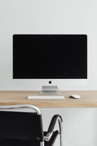 Kaboompics - Minimalist iMac Mockup with Blank Screen on Oak Home Office Desk