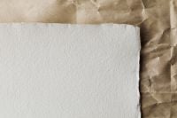 Kaboompics - Torn Edge Paper Mockup On Kraft Background