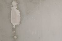 Kaboompics - Gray Plaster Wall with Peeling Paint