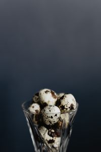 Kaboompics - Quail Eggs in Glass Bowl on Dark Background