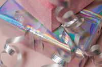 Kaboompics - Pink Gift Boxes with Holographic Wrap and Ribbon
