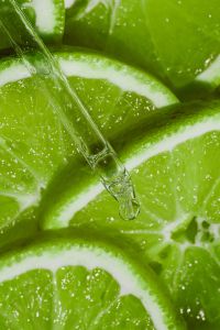 Kaboompics - Lime Slices with Dropper and Water Drops