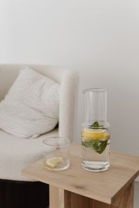 Kaboompics - Infused Water Jug Styled on a Small Wooden Table