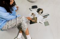 Kaboompics - Overhead Flash Photography of Woman Creating Collage on White Floor