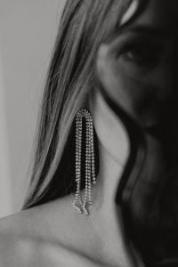 Kaboompics - Black and White Portrait of Woman Wearing Long Chain Earrings