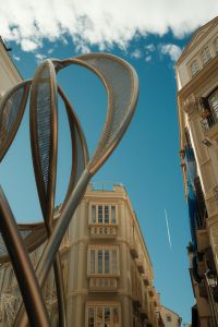 Kaboompics - Abstract Metal Sculpture Against Malaga Buildings