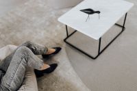 Kaboompics - Gray Jeans and Black Heels Beside a Marble Table, Minimal Home Office Outfit Styling