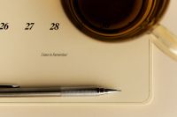 Kaboompics - Calendar Reminder Section With Silver Pen and Copy Space
