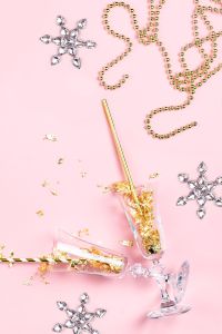 Happy New Year Pink Background with Party Decorations