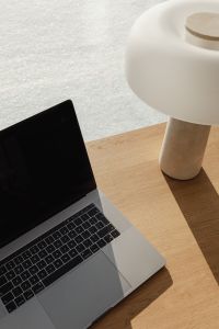 Kaboompics - Modern Stone Lamp Beside Laptop in Bright Workspace