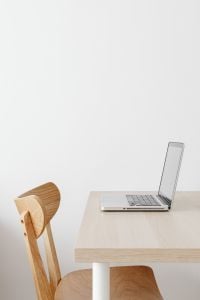 Kaboompics - Bright Neutral Home Office with Pampas Vase and Leather Sofa, Vertical Interior Background