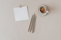 Kaboompics - Blank Card and White Pencils beside Cappuccino for a Minimal Desk Mockup