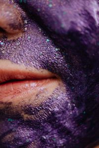Kaboompics - Macro Beauty Close-Up of Purple Face Mask Framing a Woman’s Lips