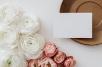Kaboompics - Blank Stationery Card with White and Pink Flowers, Plate and Color Palette