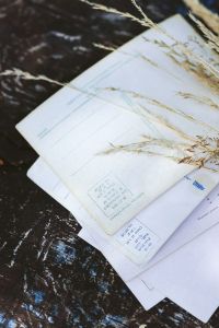 Vintage Stationery and Wheat Stems on Dark Marble