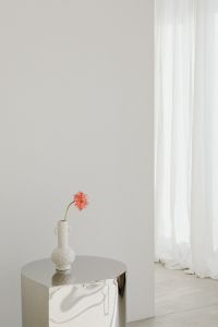 Kaboompics - White Vase on Chrome Pedestal by Sheer Curtains