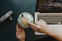 Kaboompics - Male Finger Showing A Part Of The World On An Globe