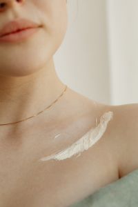 Kaboompics - Close-Up of Body Lotion Smear on Collarbone and Shoulder