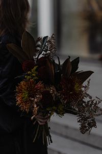 Kaboompics - Close-Up of Textured Autumn Bouquet Held by a Woman