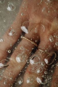 Kaboompics - Gold Chain Macro on Skin with Water Droplets
