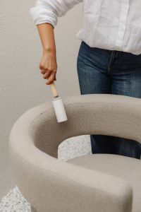 Kaboompics - Close-Up of Lint Roller on a Boucle Chair